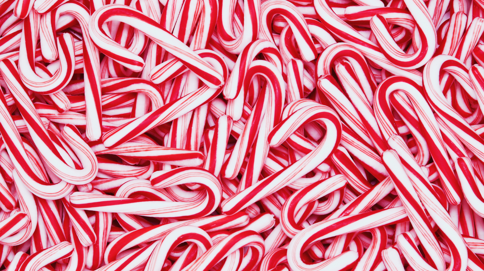 A bunch of Candy Canes covering the image.